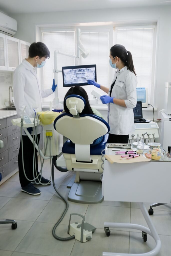 Dental hygienist discussing bad breath treatment with a patient at a dental clinic in Toronto