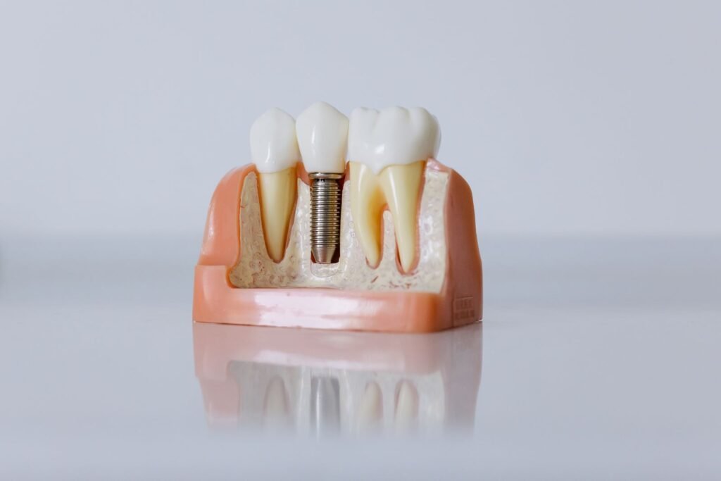 Dental hygienist checking a patient for receding gums at a dental office in North York Toronto