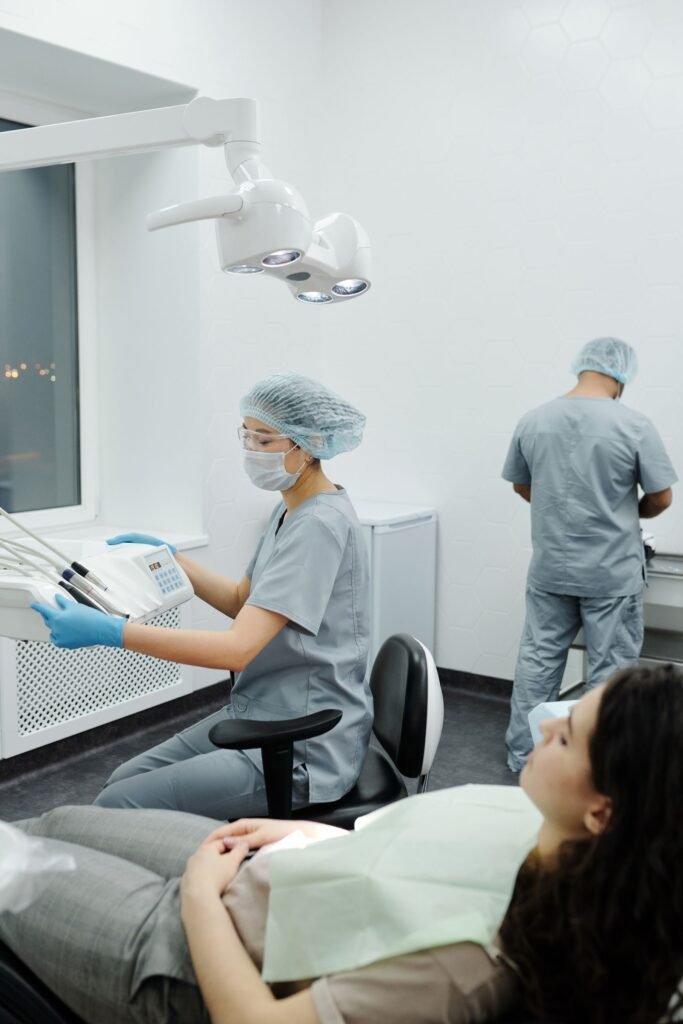 Dentist performing root canal treatment at a dental clinic in Toronto