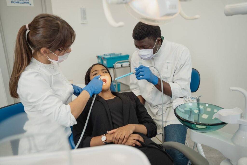 Patient with jaw pain being assessed for teeth grinding at a dental office in North York